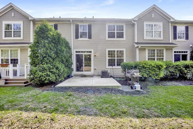 332 Buckingham Ct, Lombard, IL 60148 - back of property featuring a lawn, a patio, and a deck