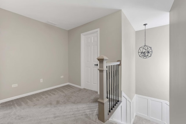 332 Buckingham Ct, Lombard, IL 60148 - stairway featuring carpet floors, a chandelier, and wainscoting