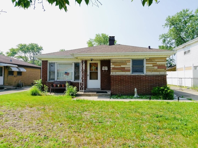 3923 153rd St, Midlothian, IL 60445 - bungalow-style home featuring brick siding and a chimney