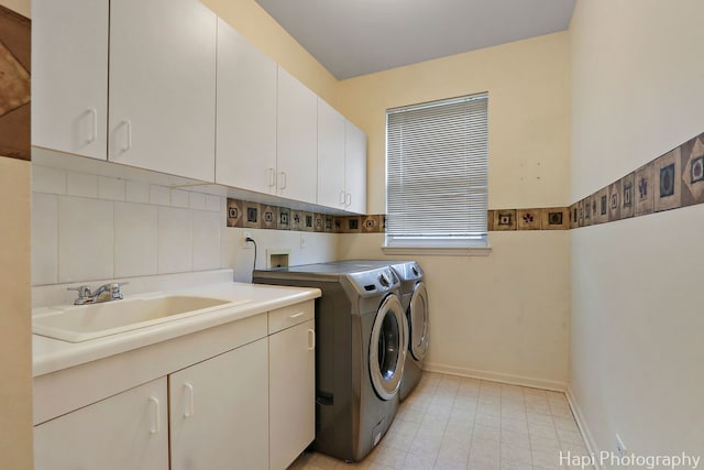 996 Highgate Ln, Grayslake, IL 60030 - washroom with independent washer and dryer, cabinet space, and light tile patterned flooring
