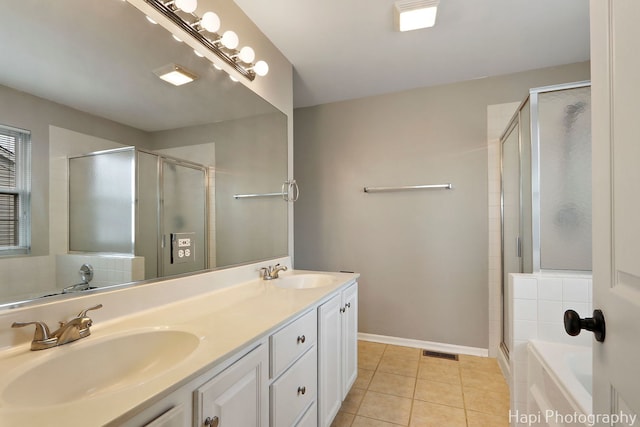 996 Highgate Ln, Grayslake, IL 60030 - full bathroom with double vanity, a shower stall, tile patterned flooring, and a garden tub