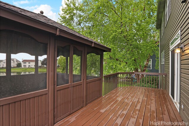996 Highgate Ln, Grayslake, IL 60030 - wooden deck with a sunroom