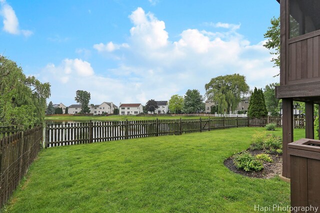 996 Highgate Ln, Grayslake, IL 60030 - fenced backyard featuring a residential view and a water view