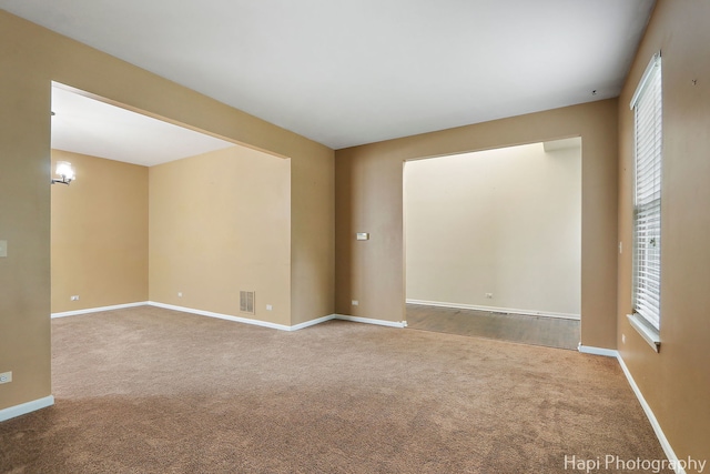 996 Highgate Ln, Grayslake, IL 60030 - spare room with carpet flooring and baseboards