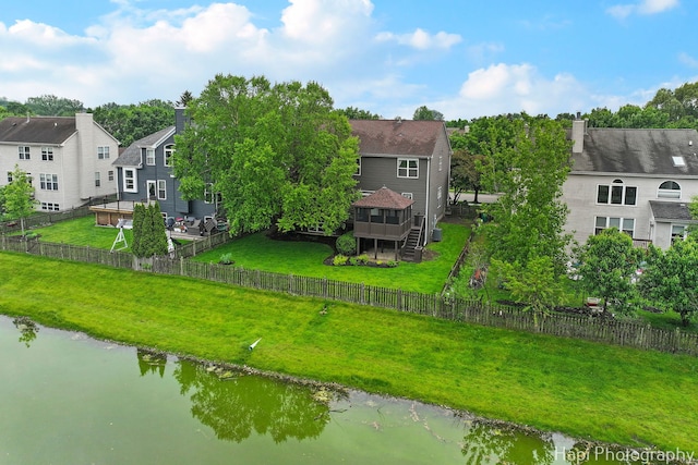 996 Highgate Ln, Grayslake, IL 60030 - back of house with a deck with water view, a fenced backyard, a chimney, a residential view, and stairway