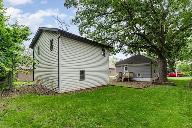 909 Woods Ave, Joliet, IL 60436 - view of side of home with a lawn