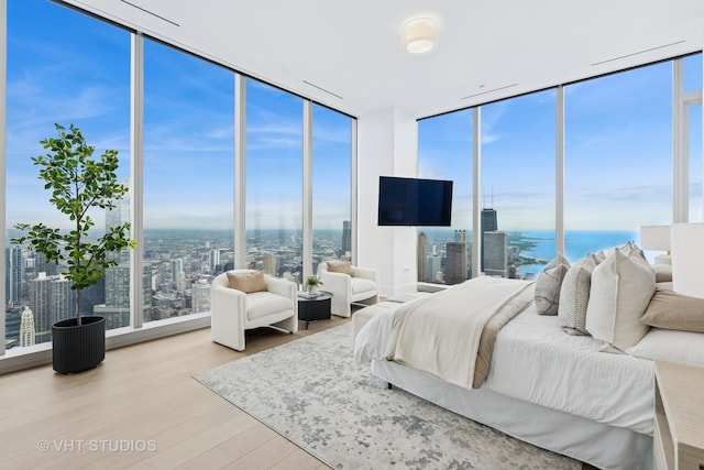 363 E Wacker Dr Unit 7501, Chicago, IL 60601 - bedroom with expansive windows and wood finished floors