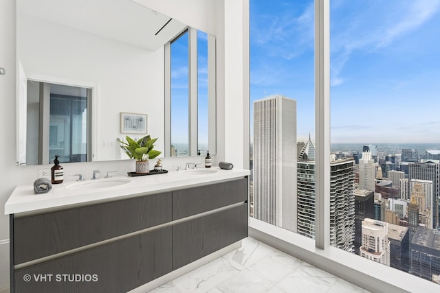 363 E Wacker Dr Unit 7501, Chicago, IL 60601 - bathroom with double vanity, marble finish floors, and a city view