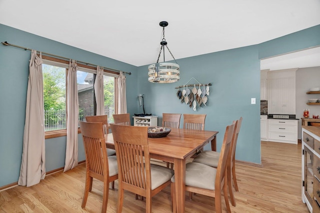 19415 Lisadell Dr, Tinley Park, IL 60487 - dining room featuring light wood finished floors, a chandelier, and baseboards