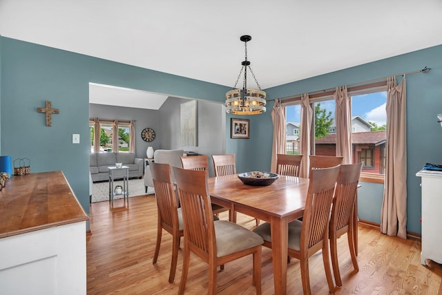 19415 Lisadell Dr, Tinley Park, IL 60487 - dining area featuring a chandelier, light wood-type flooring, and baseboards