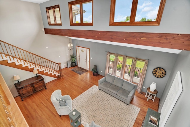19415 Lisadell Dr, Tinley Park, IL 60487 - living room with a high ceiling, wood finished floors, and stairway
