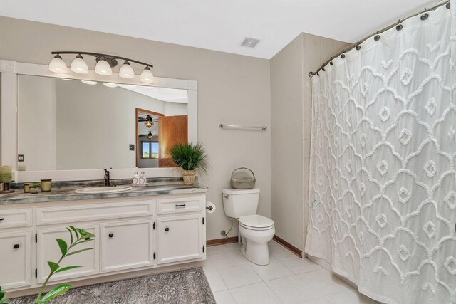 19415 Lisadell Dr, Tinley Park, IL 60487 - bathroom featuring vanity, tile patterned flooring, toilet, a shower with shower curtain, and baseboards