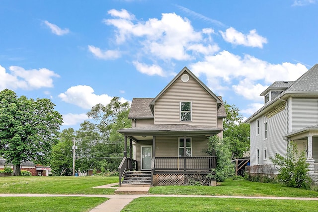 175 N Washington Ave, Kankakee, IL 60901 - view of front of house with covered porch and a front yard