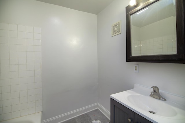175 N Washington Ave, Kankakee, IL 60901 - bathroom with vanity, baseboards, and bathing tub / shower combination