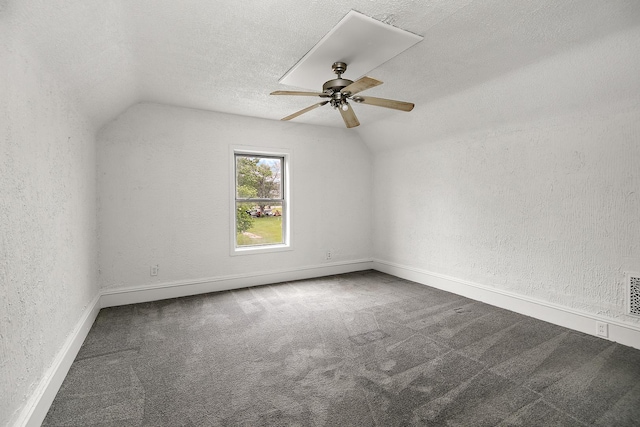 175 N Washington Ave, Kankakee, IL 60901 - bonus room with vaulted ceiling, a textured wall, carpet, ceiling fan, and a textured ceiling