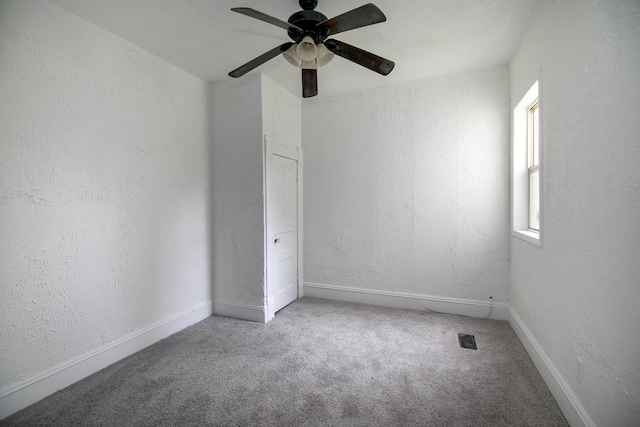 175 N Washington Ave, Kankakee, IL 60901 - spare room with carpet, a ceiling fan, baseboards, and a textured wall