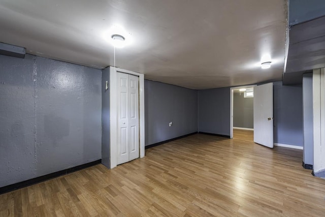 1101 Pine St, Waukegan, IL 60085 - finished below grade area with baseboards and light wood-style floors