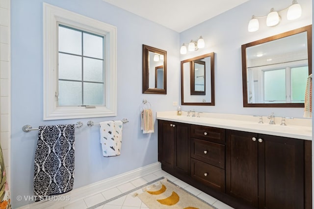 720 Beaver Rd, Glenview, IL 60025 - full bathroom with baseboards, double vanity, tile patterned flooring, and plenty of natural light