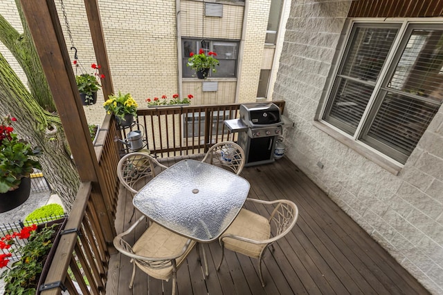 1237 W Farwell Ave Unit 2W, Chicago, IL 60626 - wooden deck featuring area for grilling and outdoor dining space