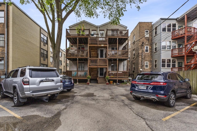 1237 W Farwell Ave Unit 2W, Chicago, IL 60626 - view of apartment building / complex featuring uncovered parking
