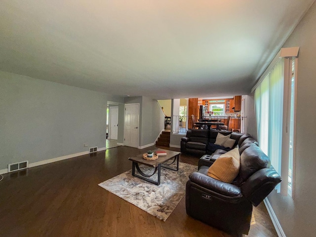 12533 S Iroquois Rd, Palos Park, IL 60464 - living area featuring dark wood-type flooring, stairway, and baseboards
