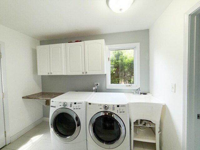 12533 S Iroquois Rd, Palos Park, IL 60464 - laundry room featuring cabinet space, light tile patterned floors, separate washer and dryer, and baseboards