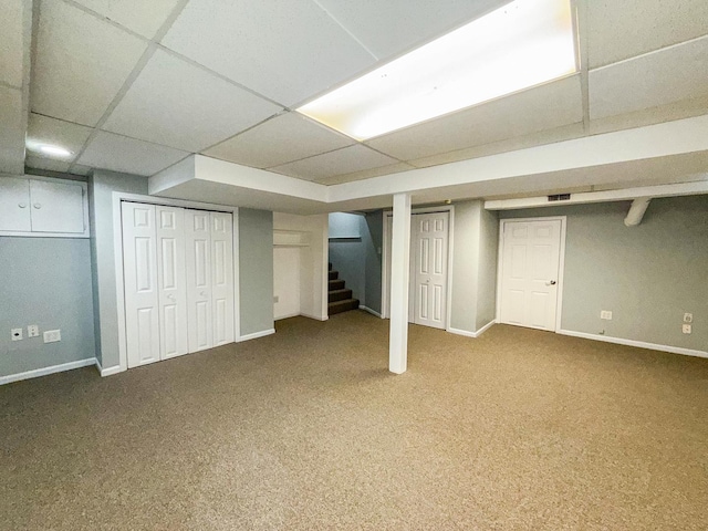 12533 S Iroquois Rd, Palos Park, IL 60464 - finished below grade area with stairway, carpet, baseboards, and a paneled ceiling