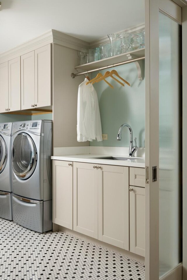 635 W Sheridan Rd Unit 3, Chicago, IL 60613 - washroom featuring washer and dryer and cabinet space