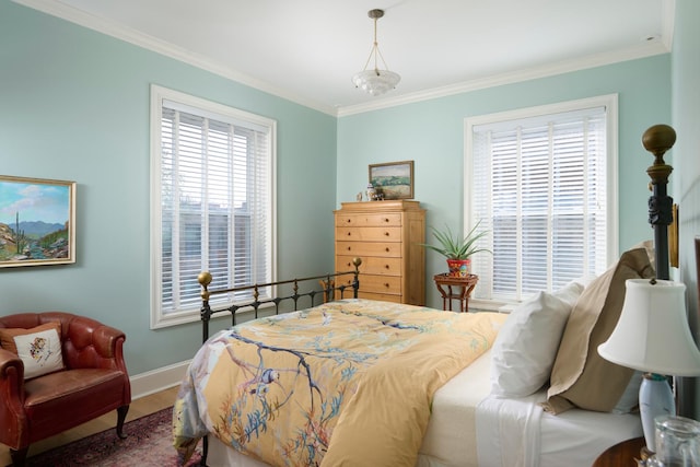 635 W Sheridan Rd Unit 3, Chicago, IL 60613 - bedroom featuring ornamental molding, baseboards, and wood finished floors