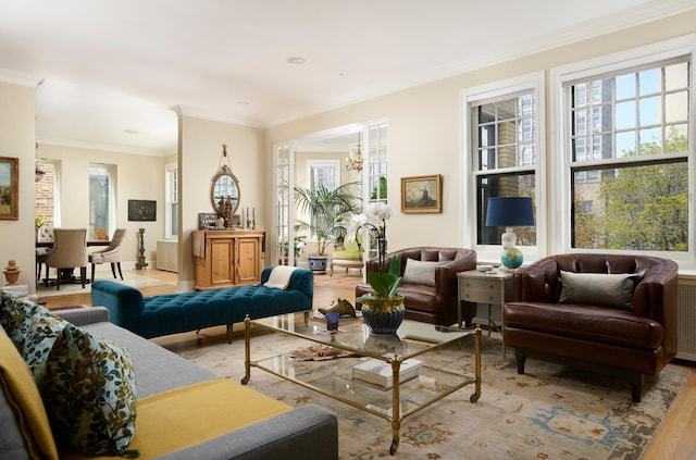 635 W Sheridan Rd Unit 3, Chicago, IL 60613 - living room with wood finished floors, plenty of natural light, crown molding, and a chandelier