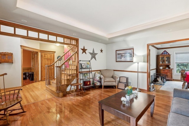 310 Westhaven Cir, Geneva, IL 60134 - living area with a raised ceiling, stairs, wood finished floors, and recessed lighting