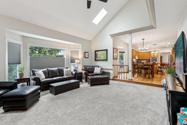 310 Westhaven Cir, Geneva, IL 60134 - carpeted living room featuring ceiling fan, high vaulted ceiling, a chandelier, and recessed lighting