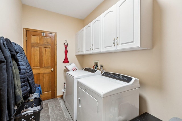 310 Westhaven Cir, Geneva, IL 60134 - laundry area with washing machine and dryer, cabinet space, and light tile patterned floors