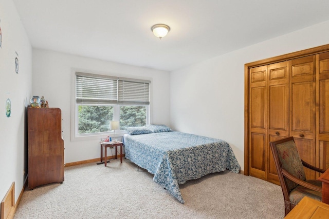310 Westhaven Cir, Geneva, IL 60134 - bedroom featuring light colored carpet, baseboards, and a closet