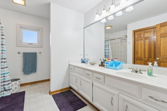 310 Westhaven Cir, Geneva, IL 60134 - bathroom featuring double vanity, curtained shower, tile patterned flooring, and baseboards