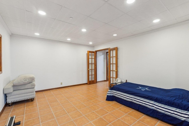 310 Westhaven Cir, Geneva, IL 60134 - bedroom featuring recessed lighting, crown molding, french doors, light tile patterned flooring, and baseboards
