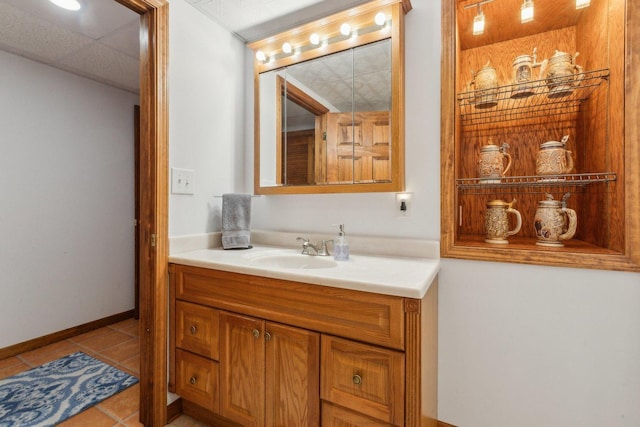 310 Westhaven Cir, Geneva, IL 60134 - bathroom with vanity, tile patterned flooring, and baseboards