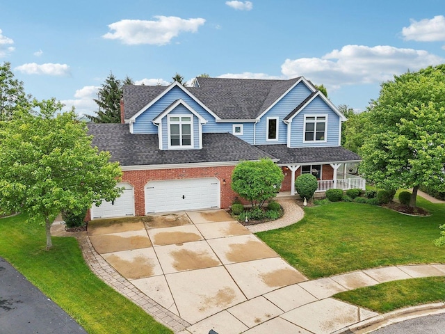 310 Westhaven Cir, Geneva, IL 60134 - traditional home featuring concrete driveway, roof with shingles, brick siding, a front yard, and a porch