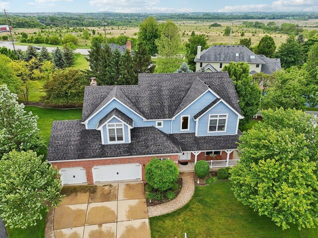 310 Westhaven Cir, Geneva, IL 60134 - view of subject property featuring a tree filled landscape