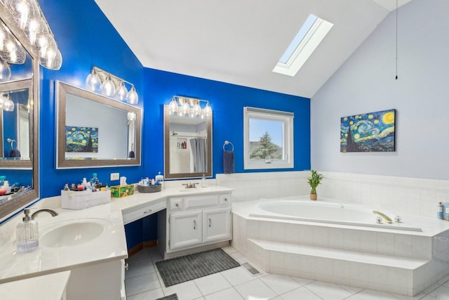 310 Westhaven Cir, Geneva, IL 60134 - bathroom with a skylight, vaulted ceiling, a bath, tile patterned flooring, and double vanity