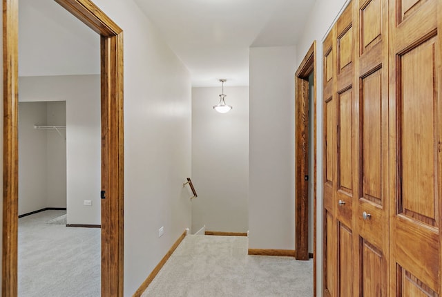 36 Shore Dr, Schaumburg, IL 60193 - hall featuring an upstairs landing, light colored carpet, and baseboards