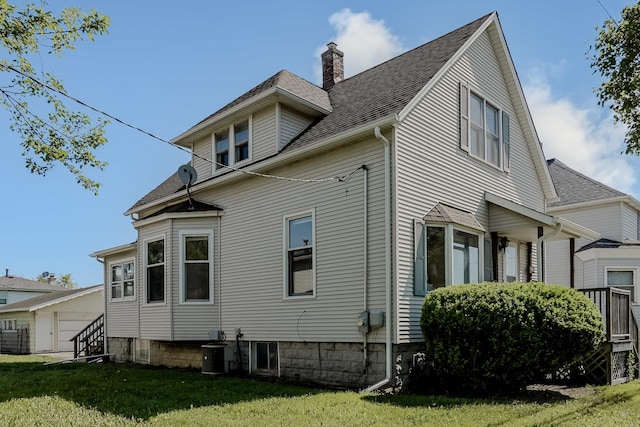 1970 E 170th St, South Holland, IL 60473 - view of side of home featuring a chimney, a yard, and a shingled roof