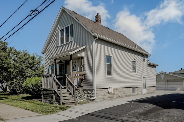 1970 E 170th St, South Holland, IL 60473 - view of property exterior with a chimney and a shingled roof
