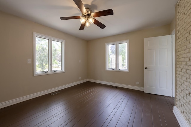 3745 Whirlaway Dr, Northbrook, IL 60062 - spare room with a ceiling fan, dark wood-style floors, and baseboards