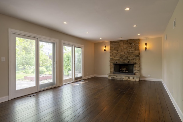 3745 Whirlaway Dr, Northbrook, IL 60062 - unfurnished living room with dark wood-type flooring, a fireplace, recessed lighting, and baseboards
