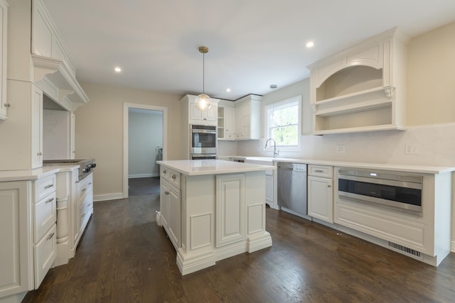 3745 Whirlaway Dr, Northbrook, IL 60062 - kitchen featuring open shelves, appliances with stainless steel finishes, a center island, light countertops, and white cabinets