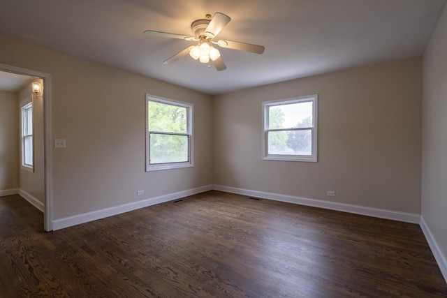 3745 Whirlaway Dr, Northbrook, IL 60062 - unfurnished room featuring dark wood-style flooring, ceiling fan, and baseboards