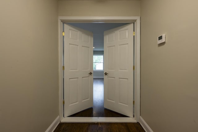 3745 Whirlaway Dr, Northbrook, IL 60062 - doorway to outside featuring dark wood finished floors and baseboards