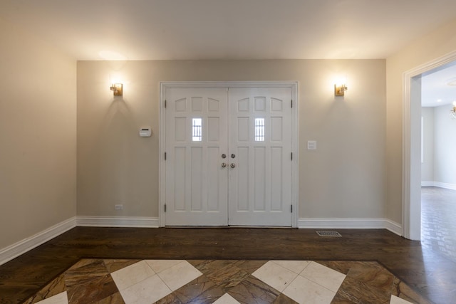 3745 Whirlaway Dr, Northbrook, IL 60062 - entryway featuring baseboards and wood finished floors
