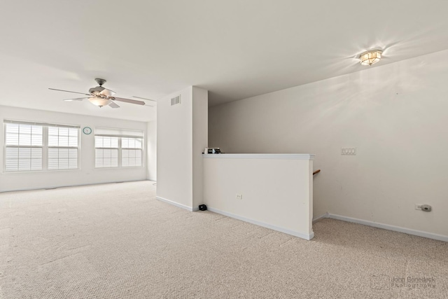 1553 Catalina Ln, Aurora, IL 60504 - empty room with carpet flooring, ceiling fan, and baseboards